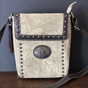 hand-tooled leather Western-style crossbody bag